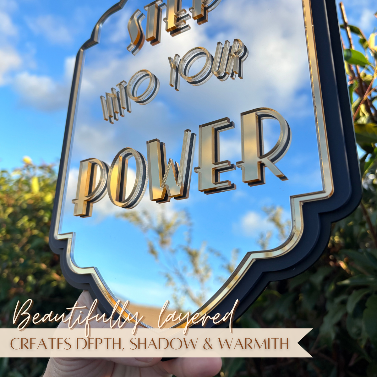 Reflective mirror detail on Step Into Your Power wall art